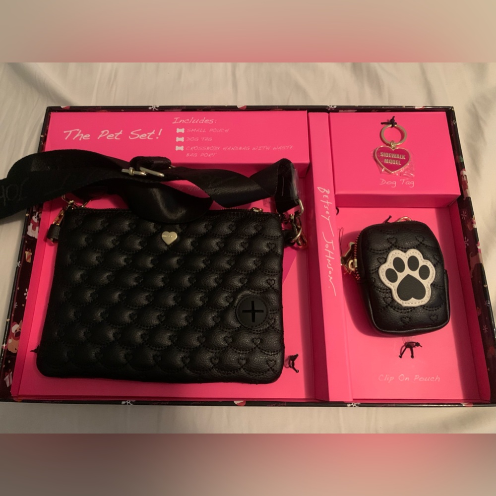 Brand new in box black Betsey Johnson Pet Set which includes crossbody bag.